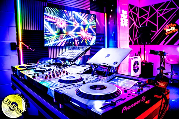 Close-up of the studio’s professional DJ decks and mixer