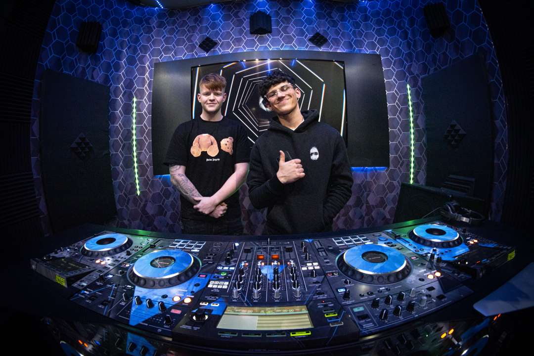 Tyler Jack and a student in the studio